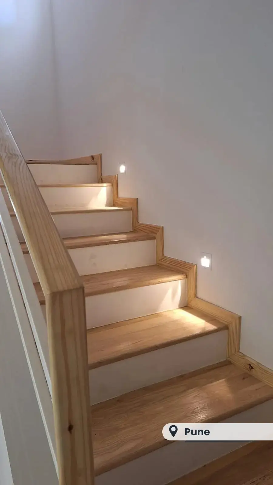 Light oak staircase with step lights, Pune