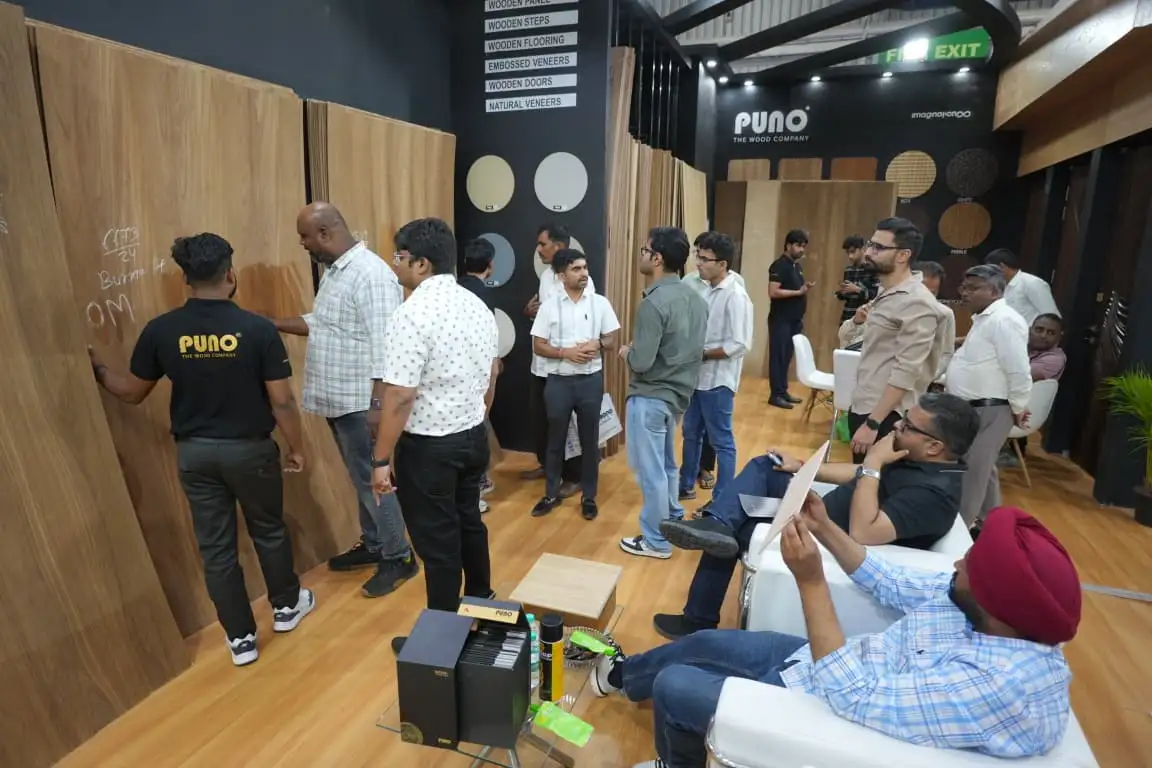 Visitors going through full veneer sheets at the Puno stand
