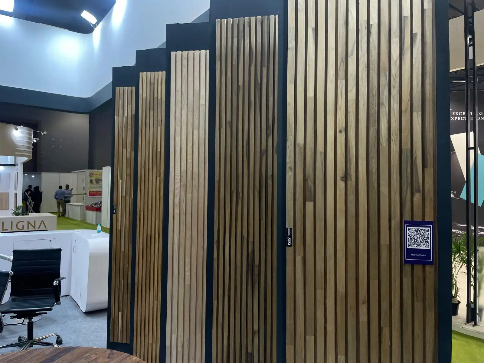 Fluted and slatted wooden panel displays at the Puno stand