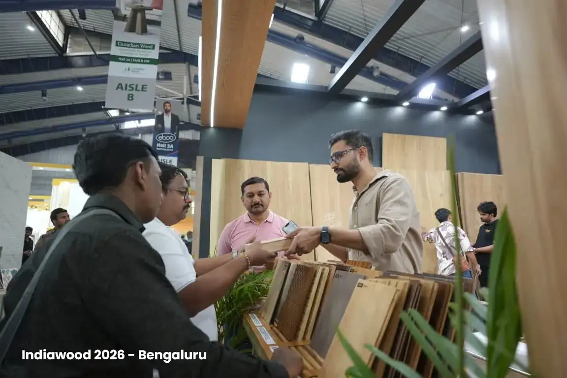 Visitors handling wood samples at the Puno sample bay